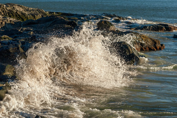 Wave smashes itself to foam