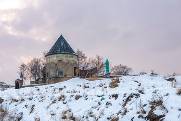 Fototapeta premium Kumbet with mosque near three kumbets in Erzurum, Turkey