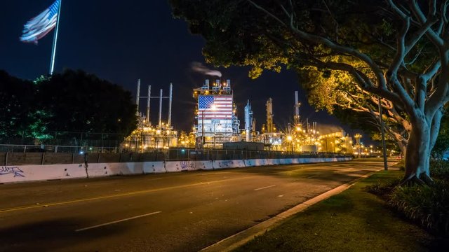 MoCo Timelapse of Oil Refinery Chemical Plant with USA Flag -Zoom In-