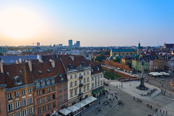 Fototapeta na wymiar Warsaw, Poland - August 11, 2017: Beautiful aerial panoramic view of Plac Zamkowy square in Warsaw, with historic building, including Sigismund III Vasa Column, and people at summer sunset, Warsaw, Po