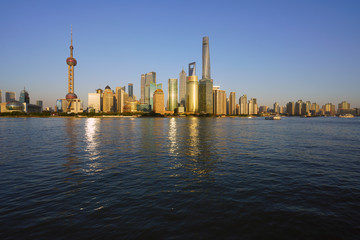 Day view of the modern Pudong skyline seen from the Bund in Shanghai, China