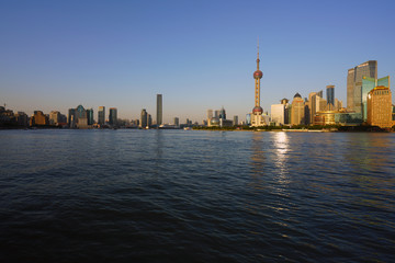 Fototapeta na wymiar Day view of the modern Pudong skyline seen from the Bund in Shanghai, China