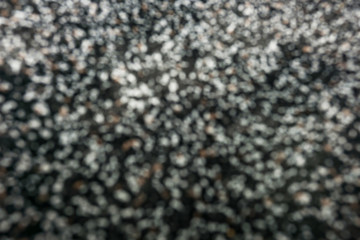 Abstract texture, background, black,  white and beyge bokeh.