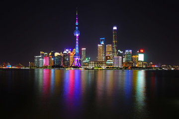 Night view of the modern Pudong skyline seen from the Bund in Shanghai, China 