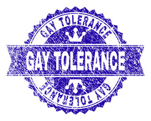 GAY TOLERANCE rosette stamp watermark with distress style. Designed with round rosette, ribbon and small crowns. Blue vector rubber watermark of GAY TOLERANCE title with corroded style.