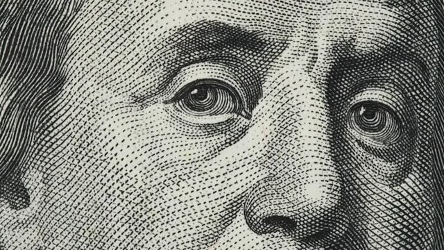 Benjamin Franklin on old US 100 dollar bill slow rotating. Stock video footage