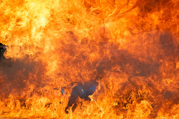 Igniting fire flame with fuel oil, Gasoline burning up in container, Fire and smoke for background