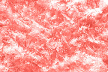 Abstract background, cracked ice texture, tined in living coral