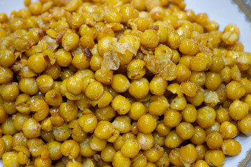 Cooking peas in a frying pan