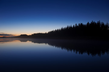 River scenery at summer night in Finland.