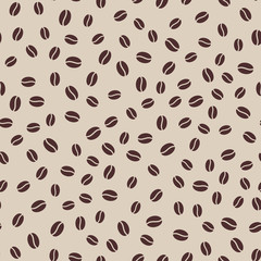 Brown coffee beans isolated on ivory background. Seamless pattern. Simple coffee texture. Vector illustration