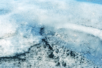 Dirty melting snow, early spring, natural background, close up detail