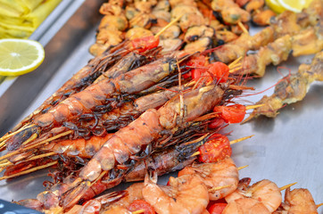 Assorted grilled seafood with big shrimps and mussels