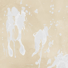 Luxury gold and white metal paint splatter effect on watercolor paper background. Gold glitter splash texture. Beautiful feminine backdrop.