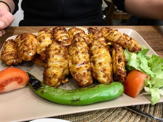 Turkish Style Spicy Chicken Wings Kebab / Kebap served at Restaurant.