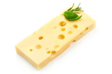 Piece of Cheese with basil and rosemary, closeup, isolated on a white background