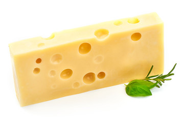 Cow Cheese with basil and rosemary, closeup, isolated on a white background