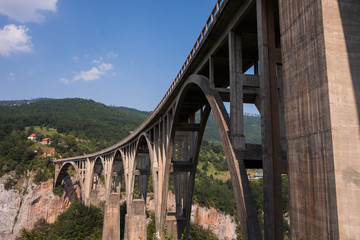 Old big bridge in Durdevica over Tara river gorge. biggest canyon in Europe. National park Durmitor, Montenegro