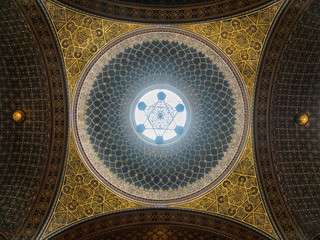 Obraz premium The dome of the Spanish Synagogue and the Star of David. The Spanish Synagogue is the newest synagogue in the area of the so-called Jewish Town.