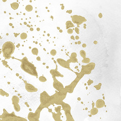 Luxury gold and white metal paint splatter effect on watercolor paper background. Gold glitter splash texture. Beautiful feminine backdrop.