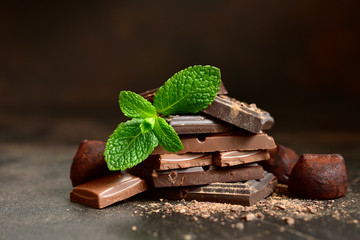 Chocolate slices with fresh mint leaves.