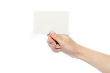 Obraz premium in the hands of advertising card on a white background
