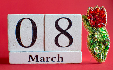 Brooch red tulip from beads of crystals and sparkles as a gift for a woman on March 8. March 8...
