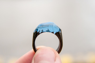 wooden ring with handmade epoxy resin