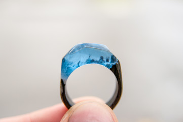 wooden ring with handmade epoxy resin