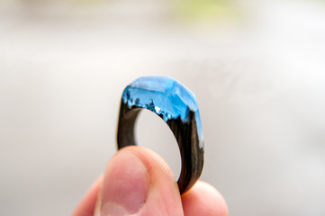 wooden ring with handmade epoxy resin