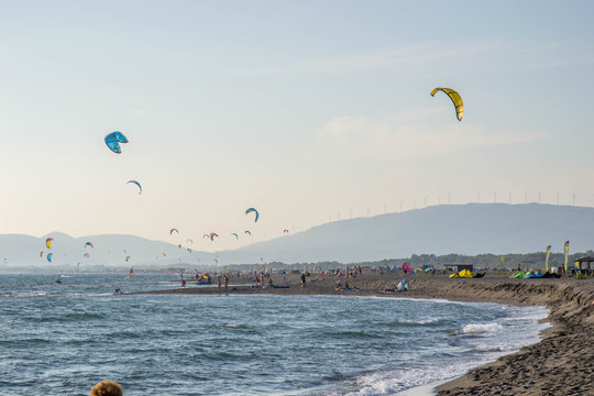 Kite surfers catch the waves on the windy Adriatic, Ulcinj, Montenegro.