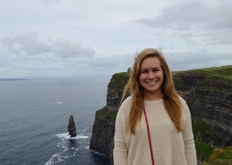 Girl by the cliffs of moher 