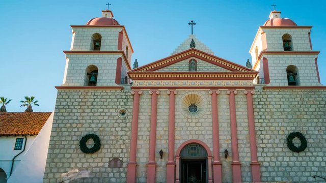 Timelapse of Tourists at Historic Church in Santa Barbra -Pan Right-