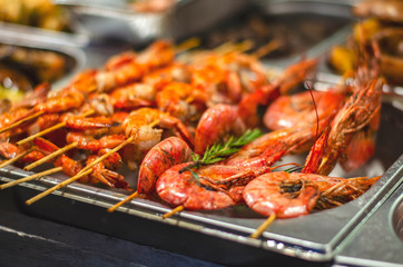grilled prawns on grill.  street food