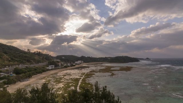 Timelapse Overview of Sunset at Exotic Coral Reef Beach in Okinawa -Tilt Up-