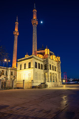 Fototapeta na wymiar Ortakoy Mosque at sunset, located just before the Bosphorus Bridge, mosque has to have one of the most picturesque settings of all of the Istanbul mosques.