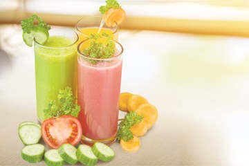 Healthy  vegetable juices on background