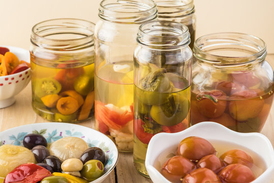 Variety of pickled vegetables. - Powered by Adobe