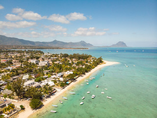 Top down aerial view of tropical beach of Black River, Mauritius island. Famous Le Morne mountain in background.