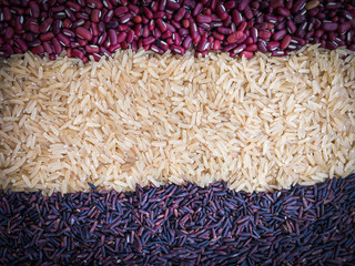 rice background / Thai Rice riceberry agricultural produce with rice purple brown rice and red kidney bean