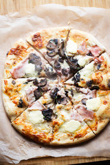 Ham, cheese and mushroom pizza