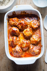 Baked pork meatballs with parmesan in tomato sauce 