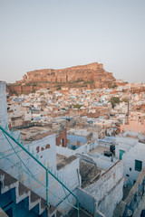 Mehrangarh Fort with the blue city of Jodhpur, Rajasthan, India in the front