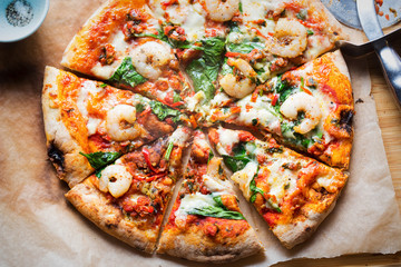 Garlic king prawn wood fired pizza with spinach & red chilli 