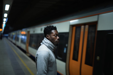 Fototapeta premium Man waiting for the train doors to open