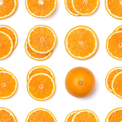 Seamless pattern of orange fruit slices. Orange slices isolated on white background. Food background. Flat lay, top view.