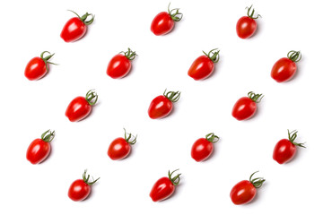 Food pattern of cherry tomato isolated on yellow background. Flat lay, top view.