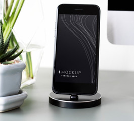 Mockup of a mobile phone on a stand