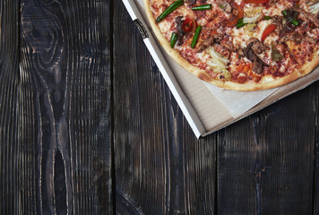 Pizza on a wooden table