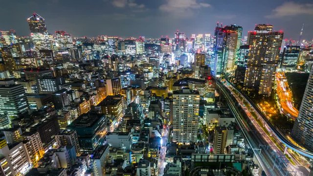 Timelapse Overview of Congested Tokyo Cityscape at Night -Pan Right-